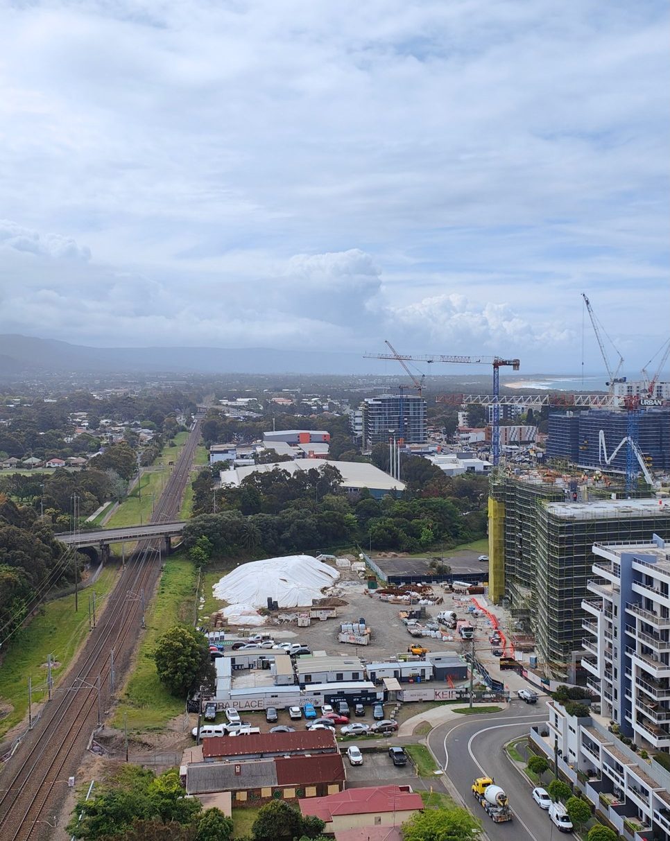 Existing view north from level 16 at 20 Belmore Street up the rail corridor towards the escarpment and coast
